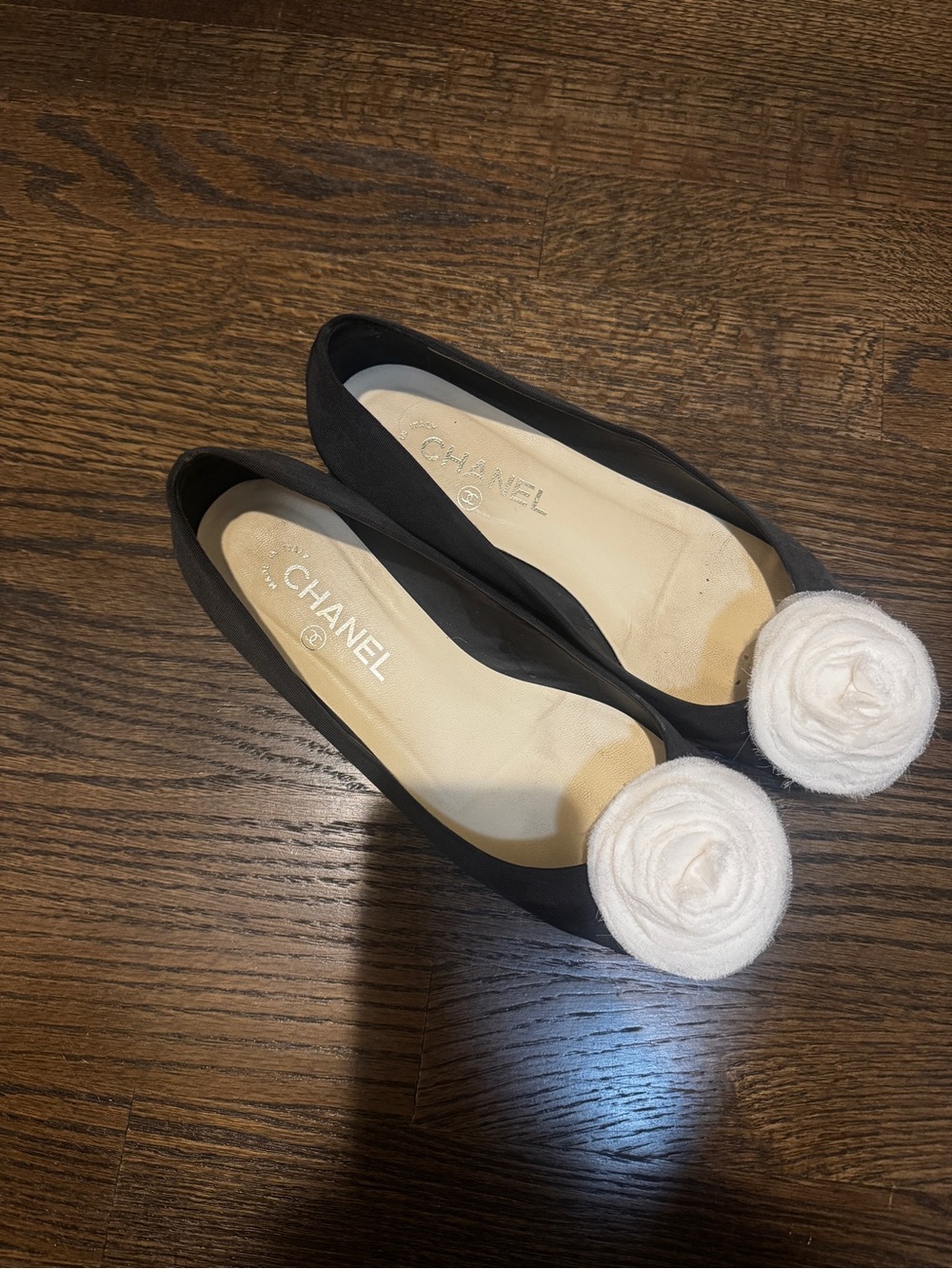 CHANEL Black Ballet Flats with Cream Camellia Rosettes